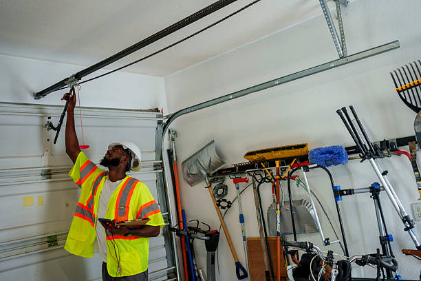 Professional Garage Door Panel Replacement technician working in Grand Traverse County County, MI